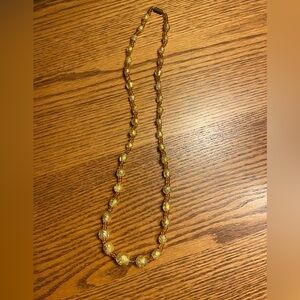 Gold tone bead necklace. 24 inch